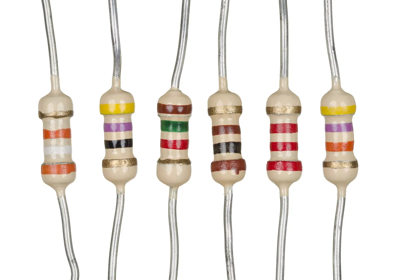 Six small resistors in a row, each with coloured bands that show its value.
